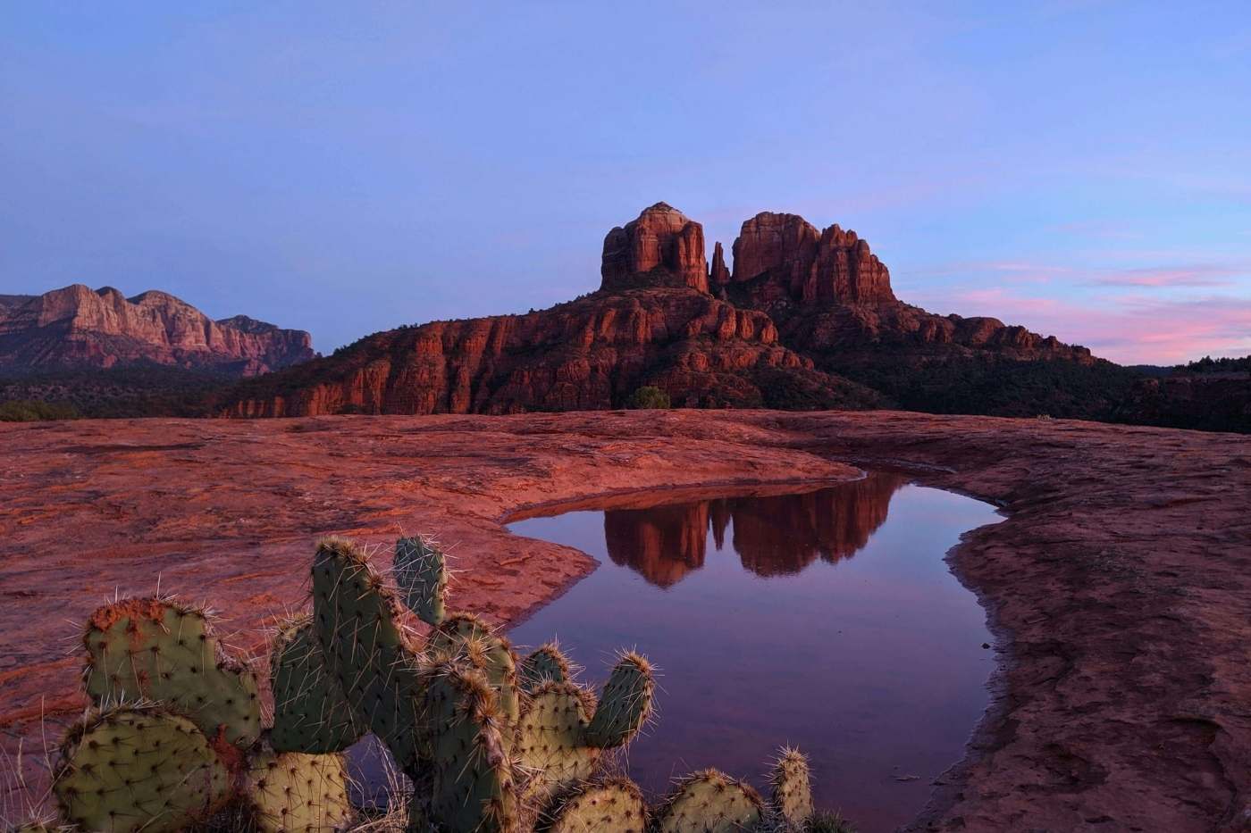 A wide view of Sedona’s red rock landscape under a bright Arizona sky
