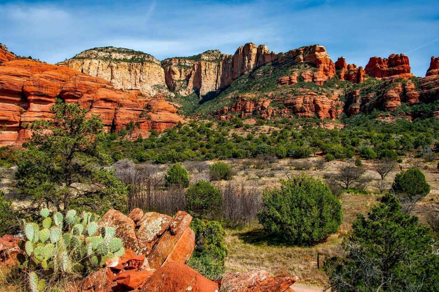 Sedona mountain formations seen from a scenic overlook during golden hour